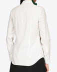 SLIM SHIRT WITH EMBROIDERY ON THE NECK