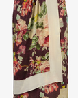 Asymmetrical overlay skirt
